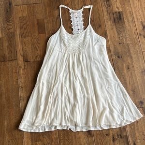 Cream a line dress with crochet detail